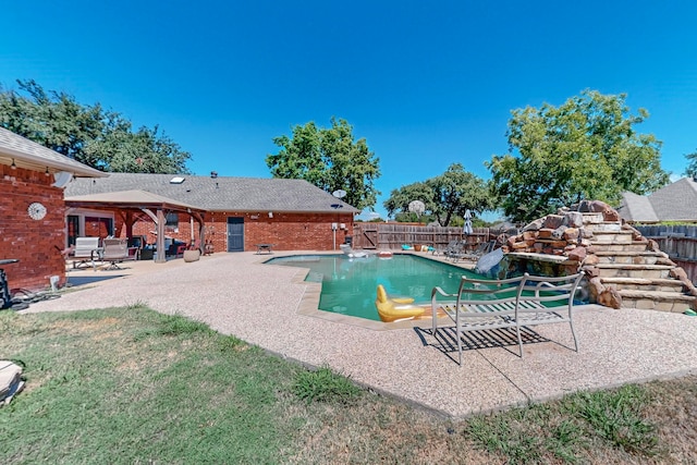 view of pool featuring a patio