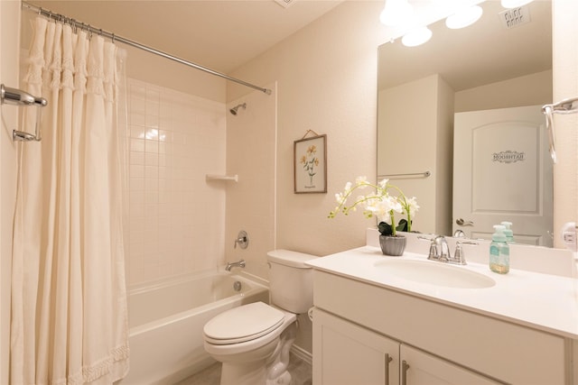 full bathroom featuring vanity, toilet, and shower / bathtub combination with curtain