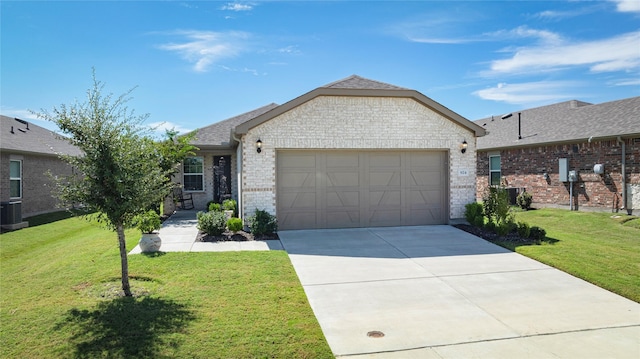 ranch-style home with a front yard, a garage, and central air condition unit