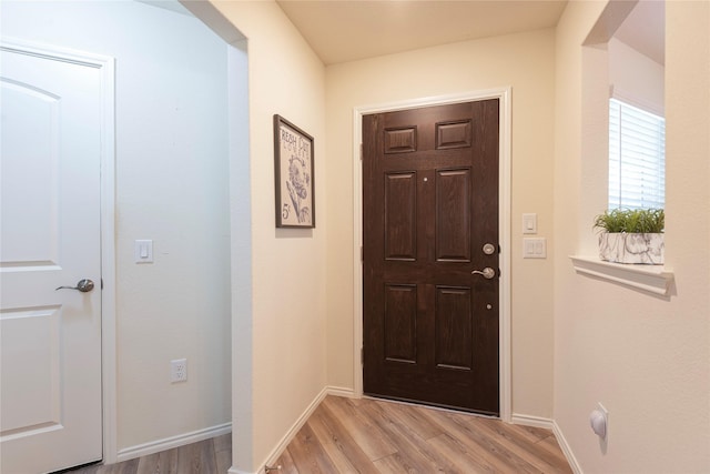 foyer entrance featuring light wood-type flooring