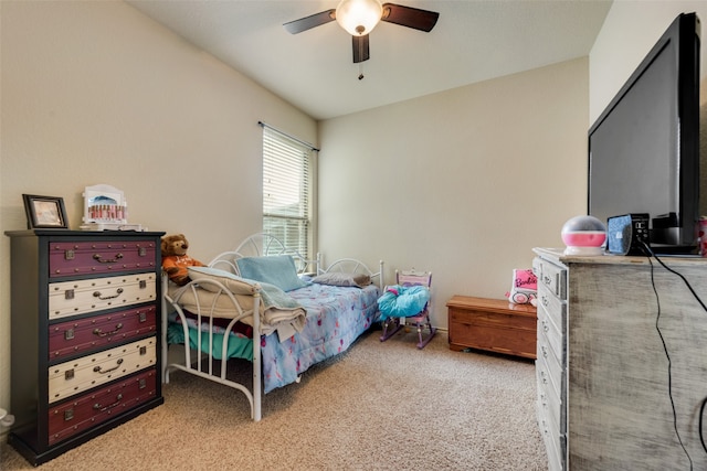 carpeted bedroom with lofted ceiling and ceiling fan