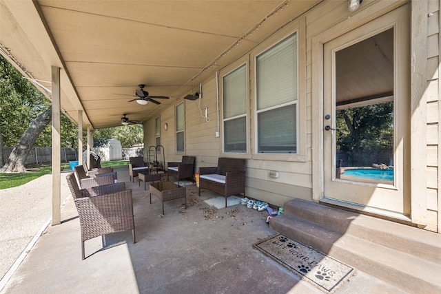 view of patio featuring ceiling fan and outdoor lounge area