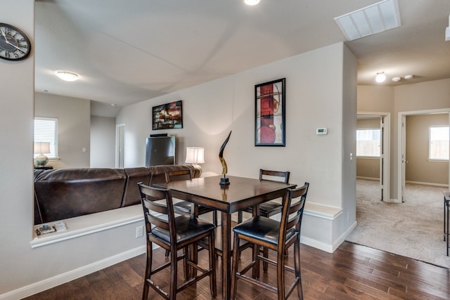 dining room featuring dark hardwood / wood-style flooring