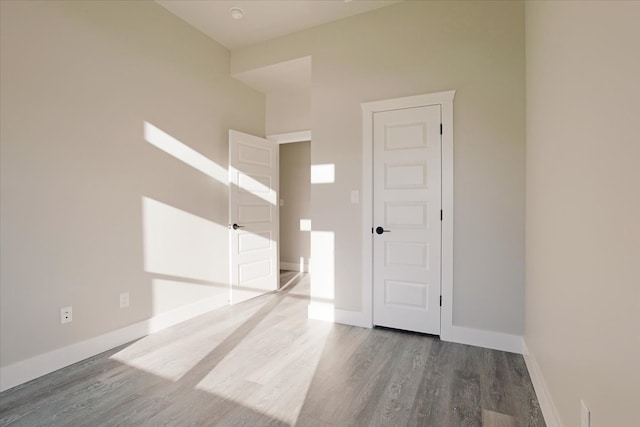 spare room featuring hardwood / wood-style floors