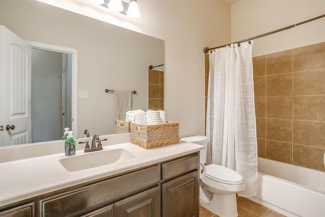 full bathroom featuring tile patterned flooring, vanity, toilet, and shower / bath combo with shower curtain