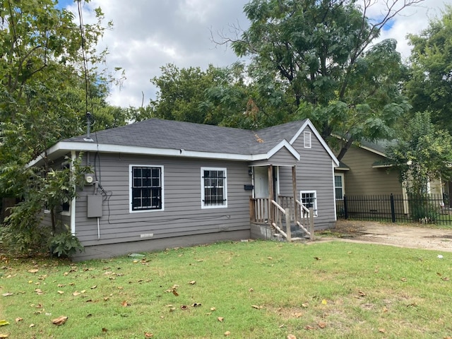 view of front of home with a front lawn