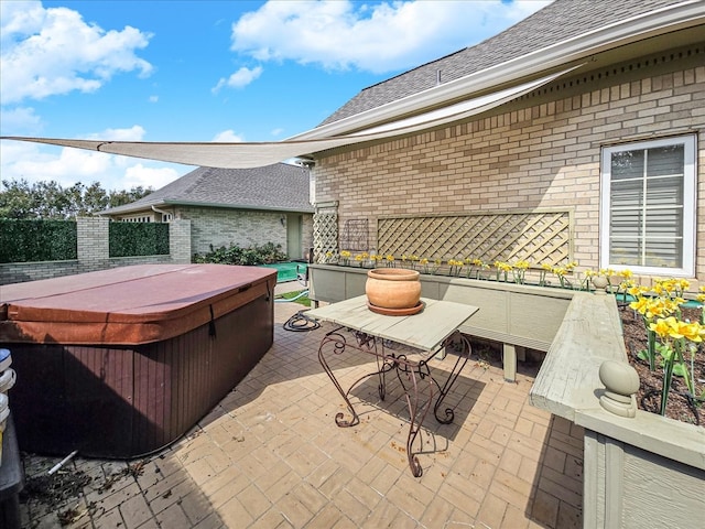 view of patio featuring a hot tub