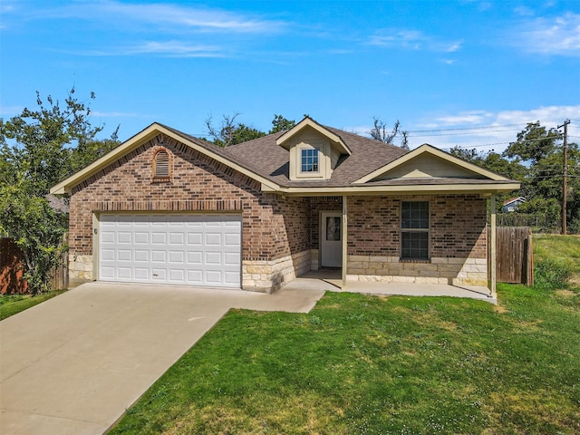 ranch-style home featuring a garage and a front lawn