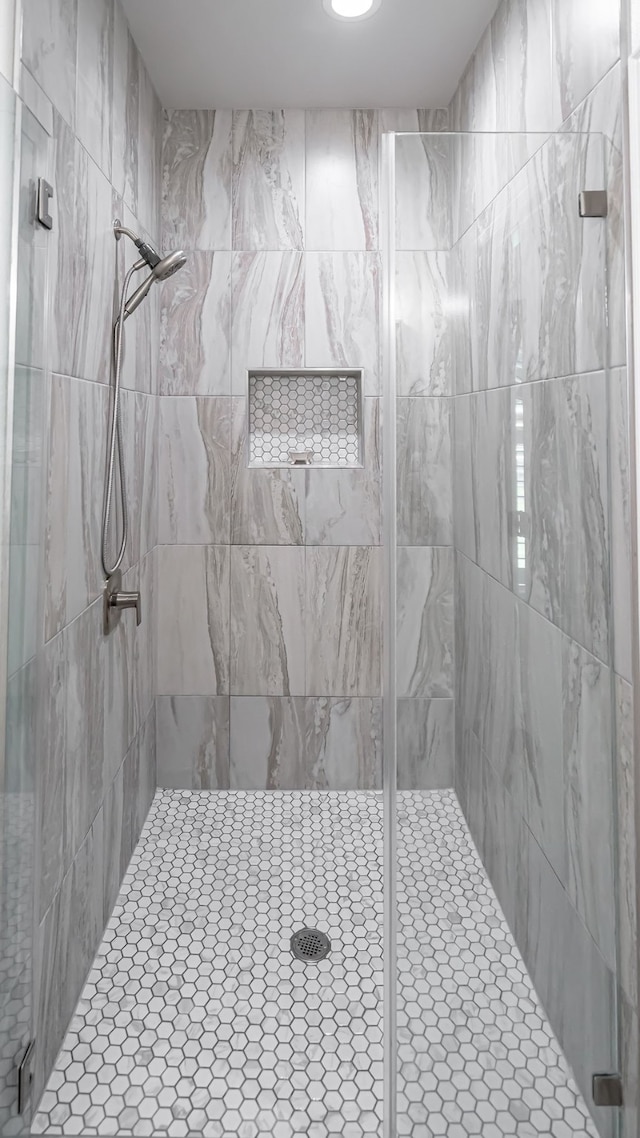 bathroom featuring walk in shower