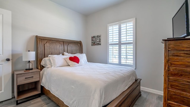 bedroom featuring light wood-type flooring