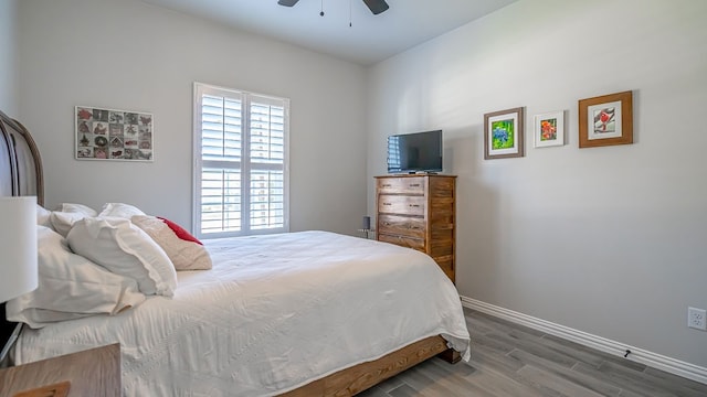 bedroom featuring ceiling fan and hardwood / wood-style floors