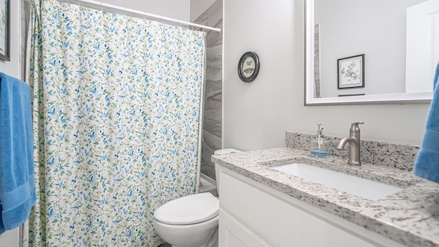 full bathroom featuring vanity, toilet, and shower / bath combo with shower curtain