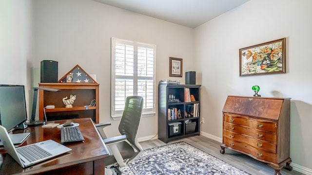 office area with light wood-type flooring