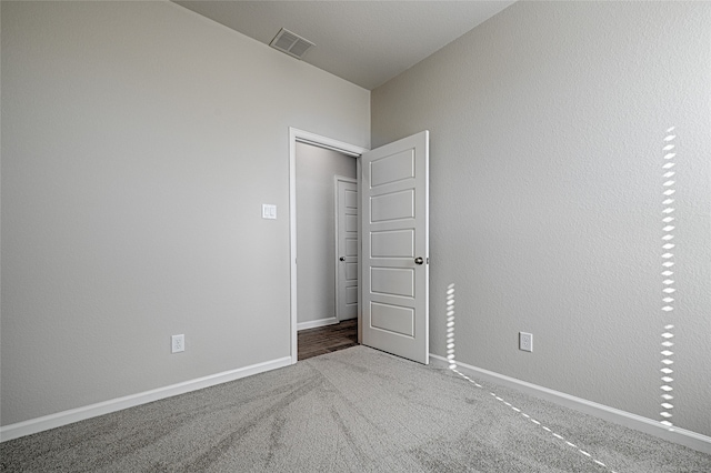 unfurnished bedroom featuring carpet