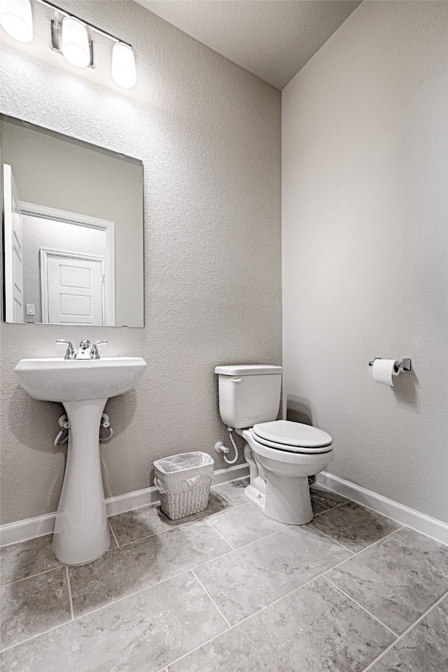 bathroom featuring toilet