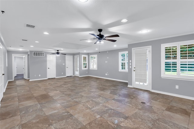 unfurnished living room featuring ornamental molding and ceiling fan