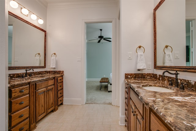 bathroom featuring ornamental molding, tile patterned flooring, ceiling fan, and vanity