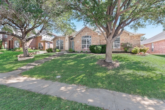 view of front of house with a front lawn