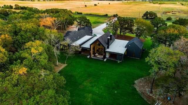 birds eye view of property featuring a rural view