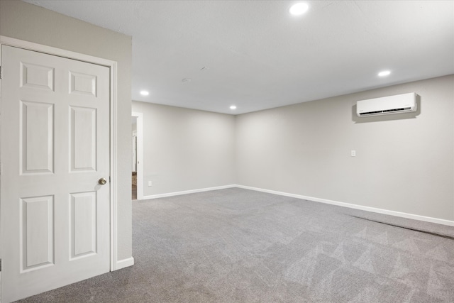 basement with carpet and a wall unit AC