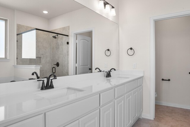10 Louis Rd, Sherman, TX 75090 - bathroom with double vanity, a sink, toilet, and a shower stall