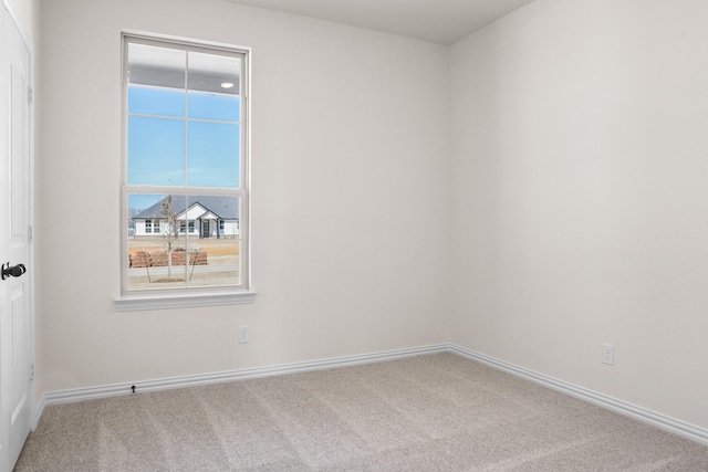 10 Louis Rd, Sherman, TX 75090 - empty room featuring carpet flooring and baseboards