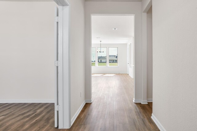 10 Louis Rd, Sherman, TX 75090 - hall featuring dark wood-type flooring and baseboards