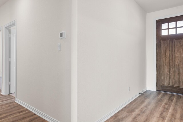 10 Louis Rd, Sherman, TX 75090 - entryway with baseboards and wood finished floors