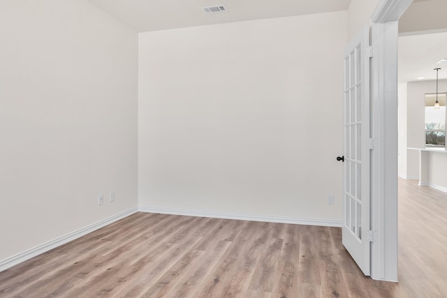 10 Louis Rd, Sherman, TX 75090 - empty room featuring light wood-style floors, visible vents, and baseboards
