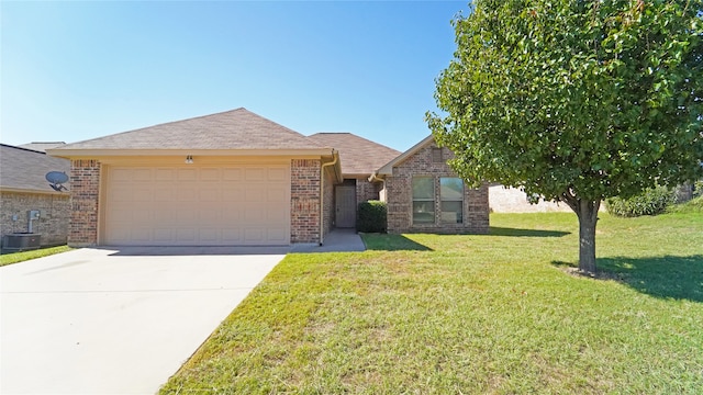 view of front of home with a garage, central air condition unit, and a front yard