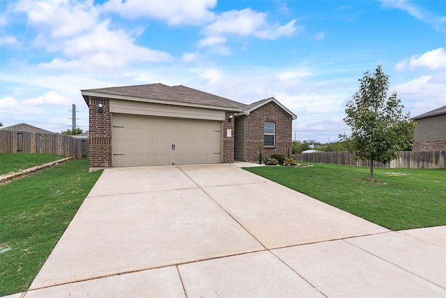 single story home featuring a garage and a front yard