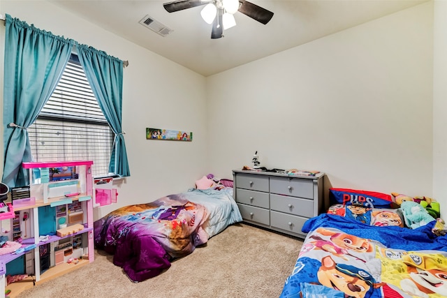 carpeted bedroom with ceiling fan