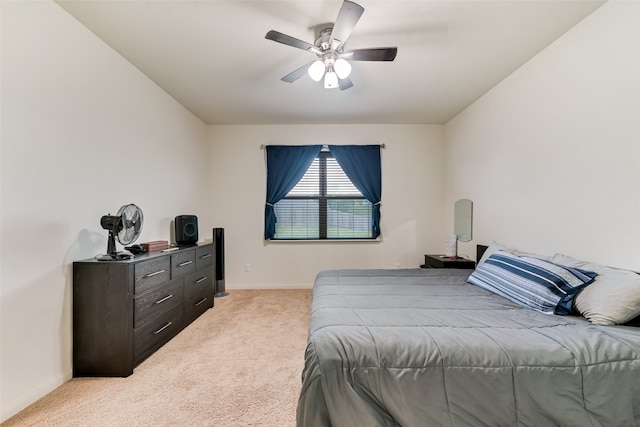 bedroom featuring ceiling fan and light colored carpet