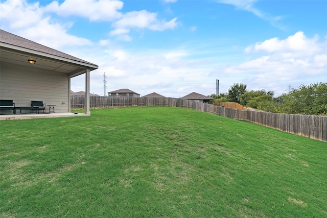 view of yard with a patio area