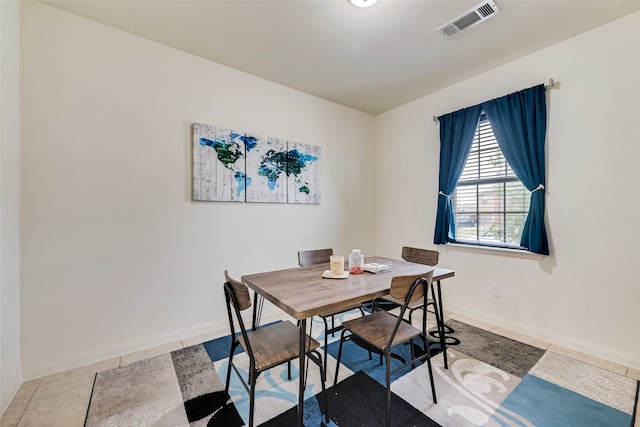 dining room with light tile patterned floors