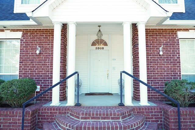 doorway to property with covered porch