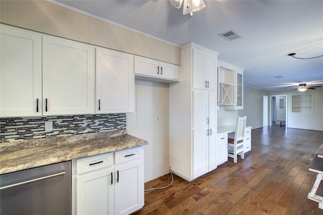 kitchen featuring ceiling fan, dark wood-type flooring, white cabinetry, dark stone countertops, and decorative backsplash