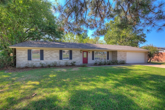 single story home featuring a front yard and a garage