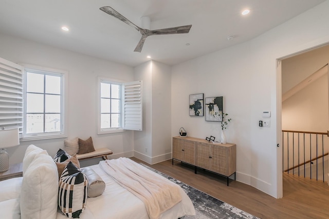 bedroom featuring recessed lighting, baseboards, and wood finished floors