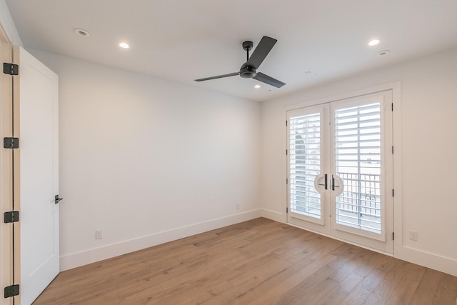 spare room featuring ceiling fan, recessed lighting, light wood-type flooring, and baseboards