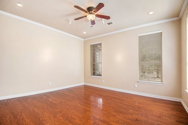 empty room with wood-type flooring, crown molding, and ceiling fan