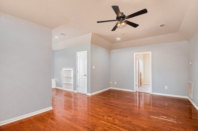 empty room featuring ceiling fan and hardwood / wood-style flooring