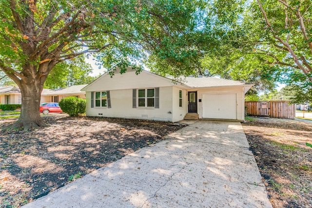 single story home featuring a garage