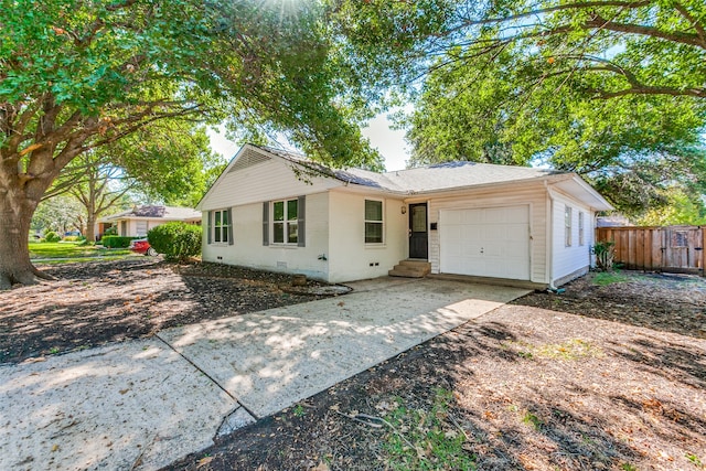 single story home with a garage