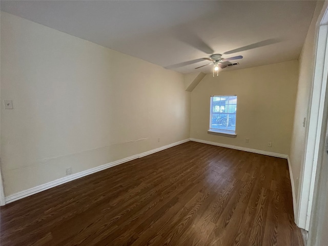 unfurnished room featuring ceiling fan and dark hardwood / wood-style floors