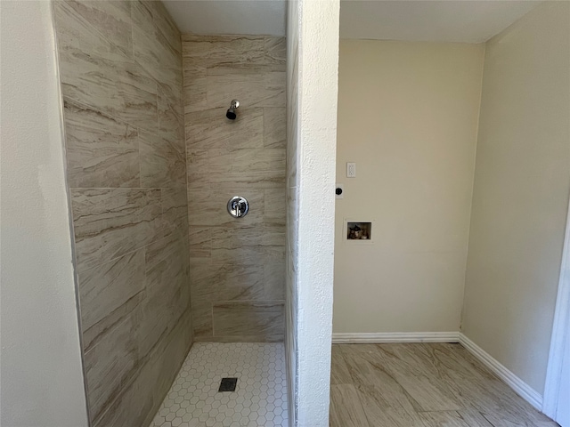 bathroom featuring a tile shower