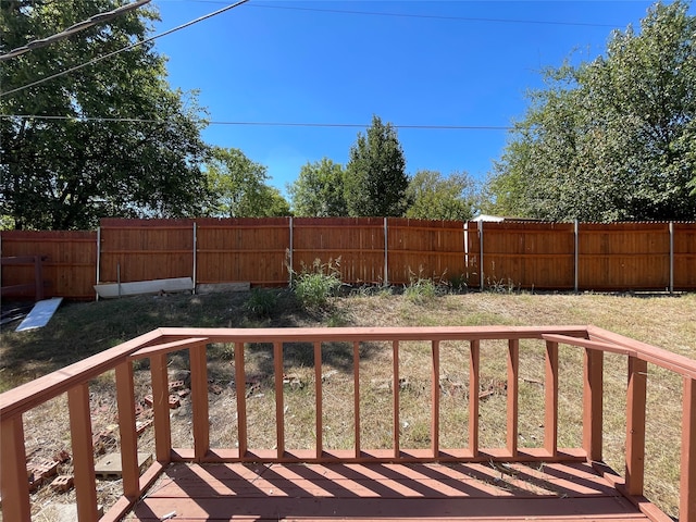 view of yard featuring a wooden deck