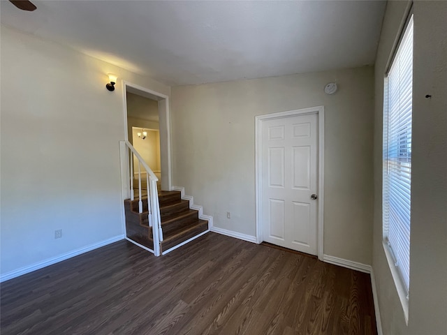 unfurnished room featuring dark hardwood / wood-style floors