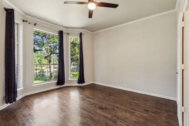 empty room with ceiling fan, dark hardwood / wood-style floors, and crown molding