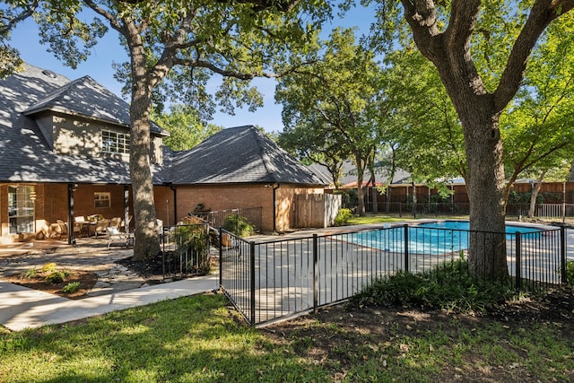 view of pool featuring a patio area